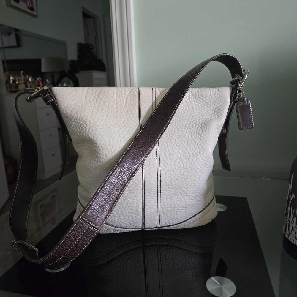 Coach Pebbled Leather Crossbody Shoulder Bag Beige With Brown Accents.
